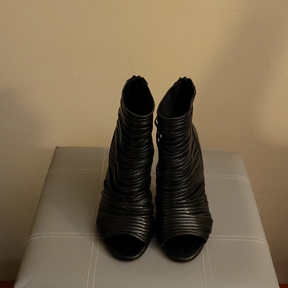 Peep toe ankle boots with back zipper.